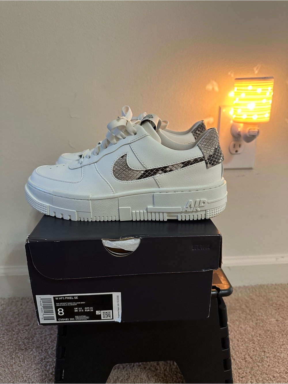 Nike White Low-Profile Sneakers with Snake-Print Swoosh